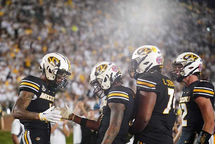 Missouri Tigers wide receiver Theo Wease Jr. (1) celebrates with wide receiver Luther Burden III (3) after Wease s touchdown against the Middle Tennessee Blue Raiders during the second half at Faurot Field at Memorial Stadium.